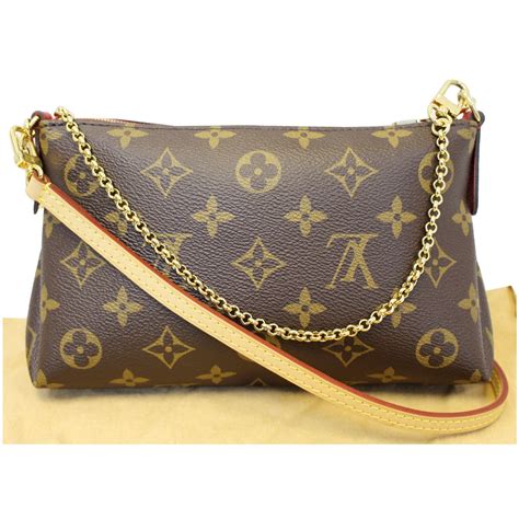 louis vuitton canvas clutch|louis vuitton retired evening clutch.